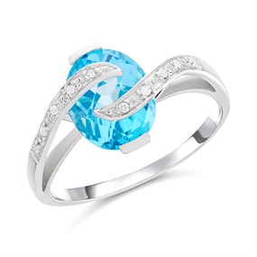 9ct White Gold Oval Blue Topaz And Diamond Ring - D63198